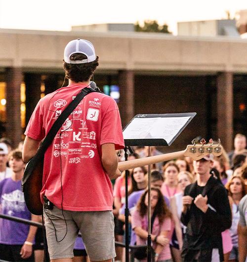 students leading worship on SBU lawn